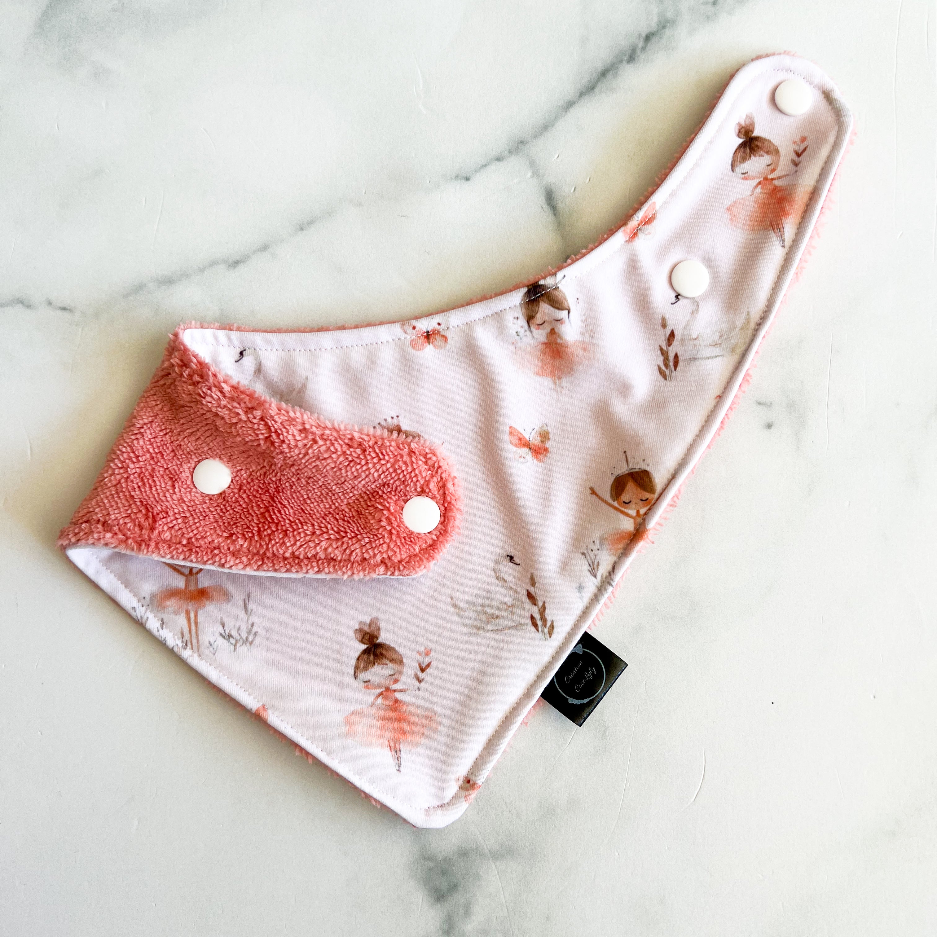 Bavoir les ballerines dos rose