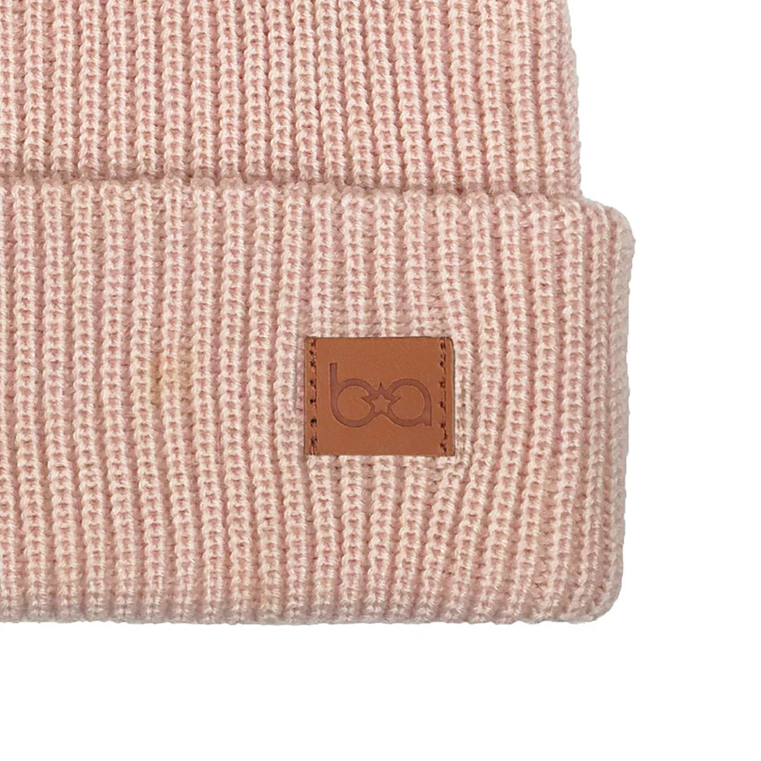 Tuque a pompom rose pâle